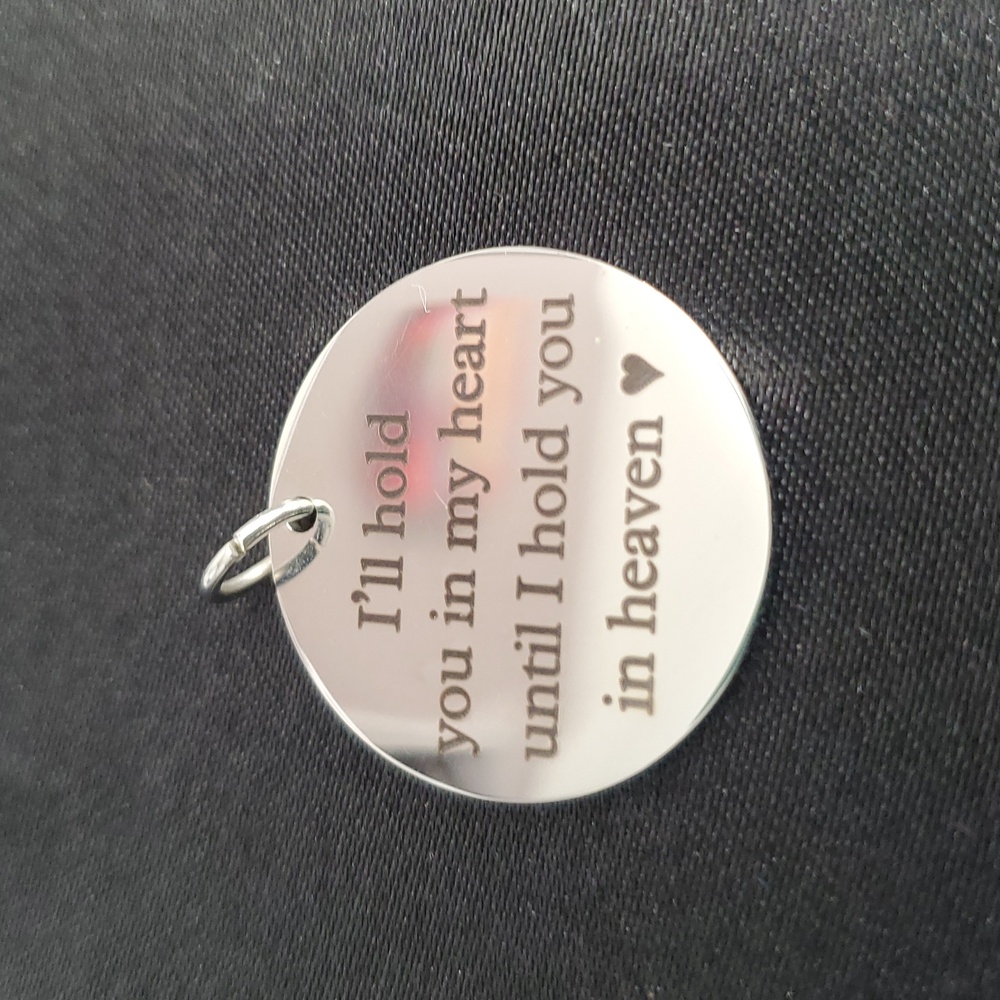 Stainless steel charm